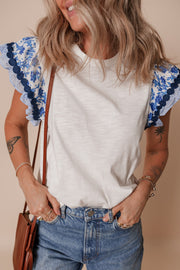 Round Neck Printed Ruffled Cap Sleeve Blouse.