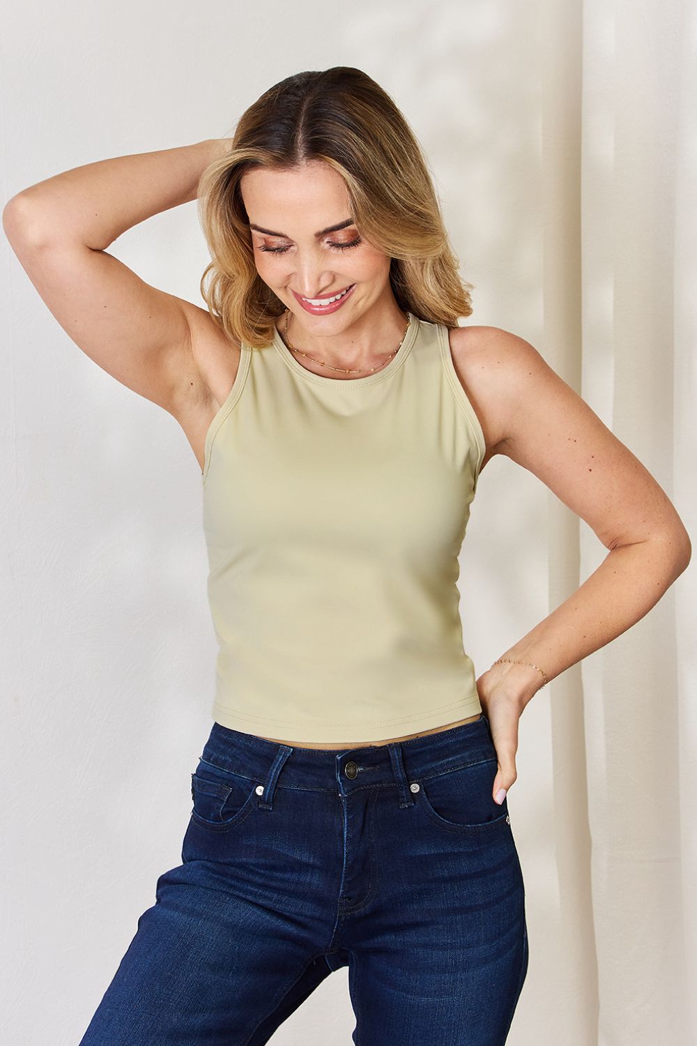 Full size round neck slim tank top.