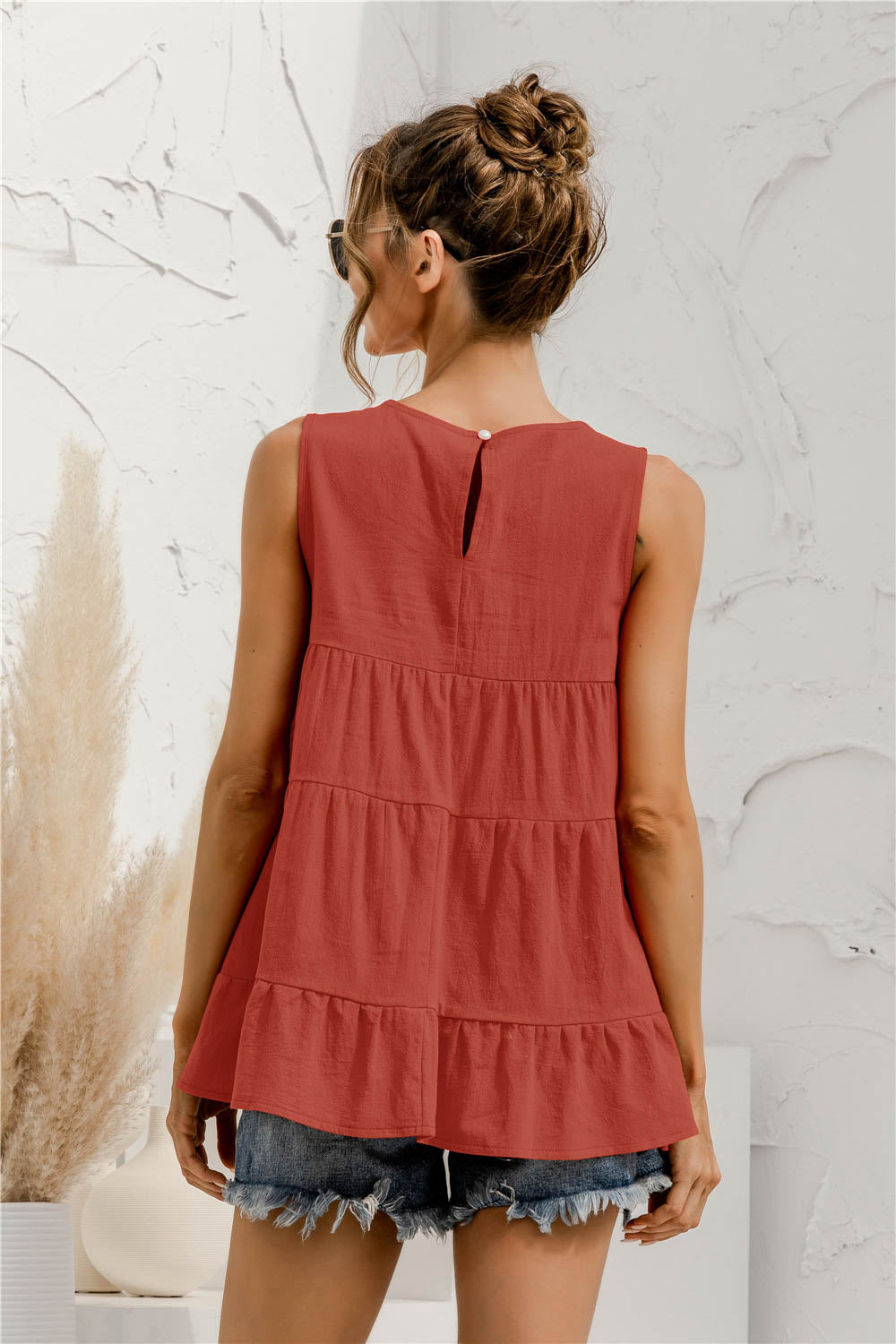 Round neck tiered babydoll tank top.