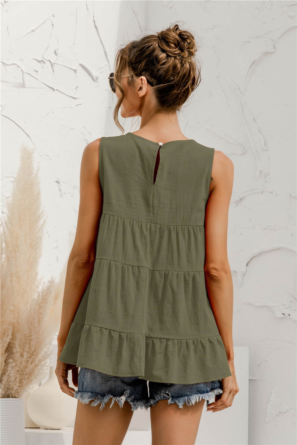 Round neck tiered babydoll tank top.