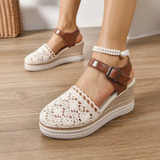 Mesh and PU leather round toe mid-heel wedge sandals.