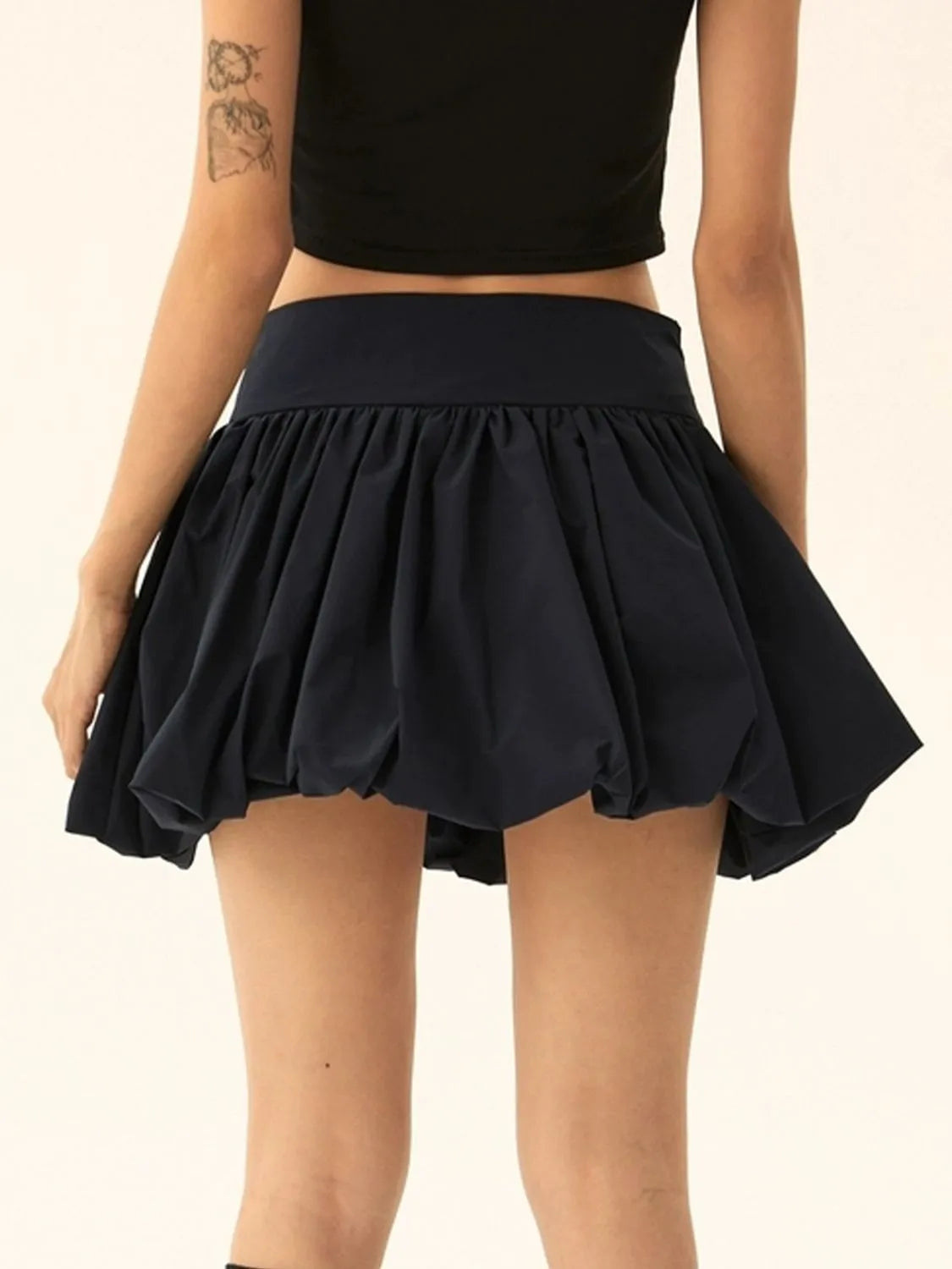 Ruched Bubble Hem Mini Skirt.