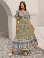 Ruched Printed Flounce Sleeve Maxi Dress.