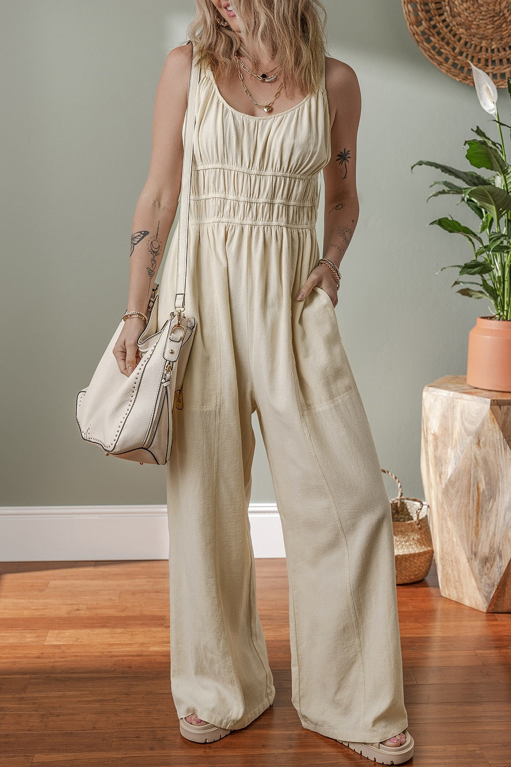 Textured Zip Front Romper with Pockets and Chain.