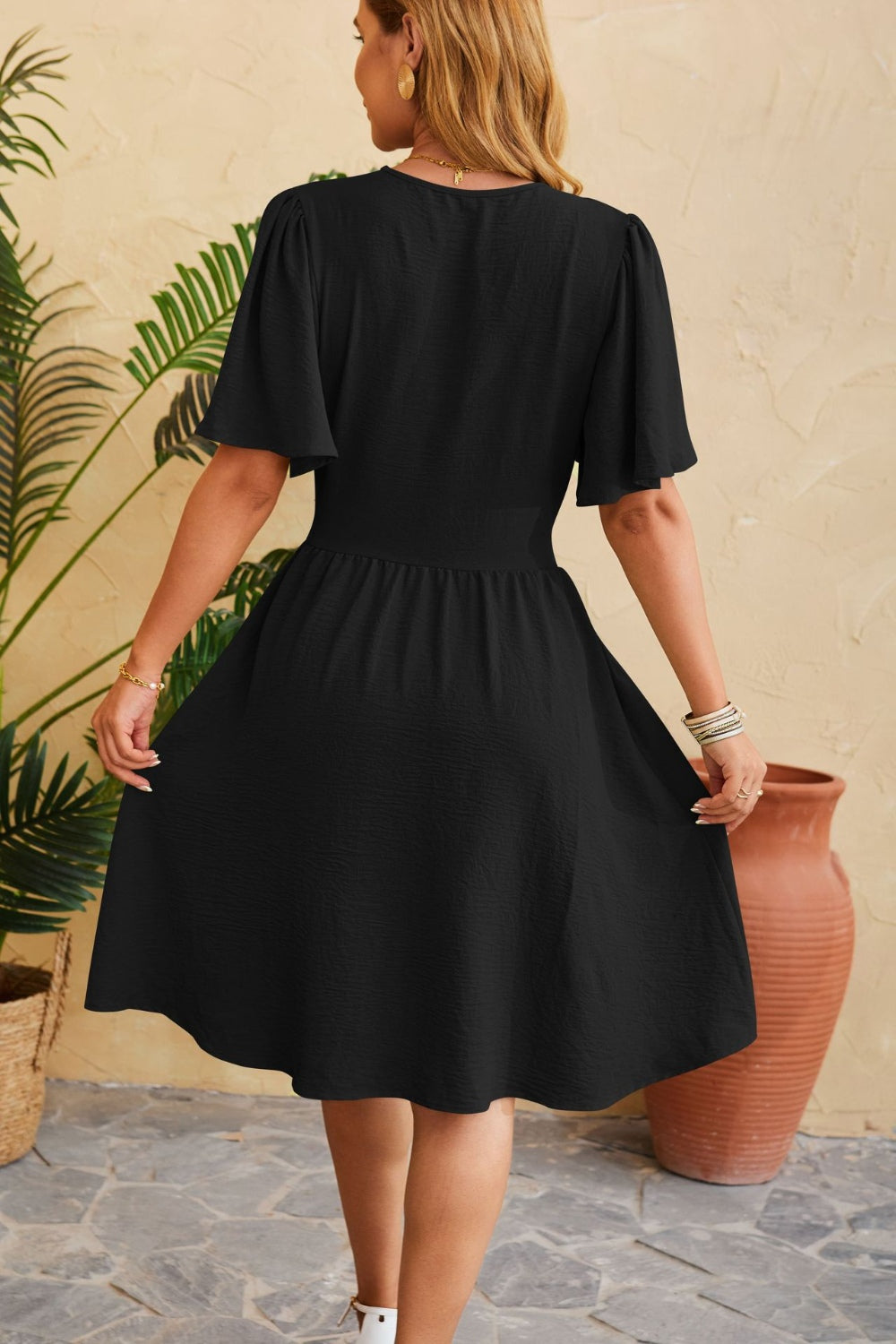 Ruched Surplice Short Sleeve Dress.