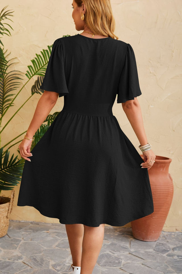 Ruched Surplice Short Sleeve Dress.