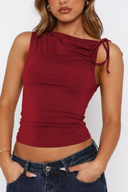 Ruched tied solid color tank top.
