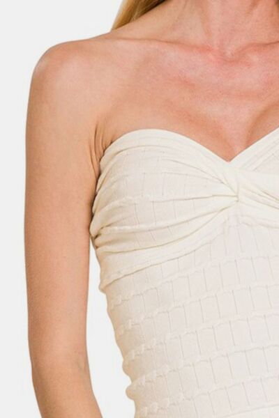 Ruched twisted sweetheart neck top, opaque and slightly stretchy.