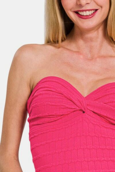 Ruched twisted sweetheart neck top, opaque and slightly stretchy.