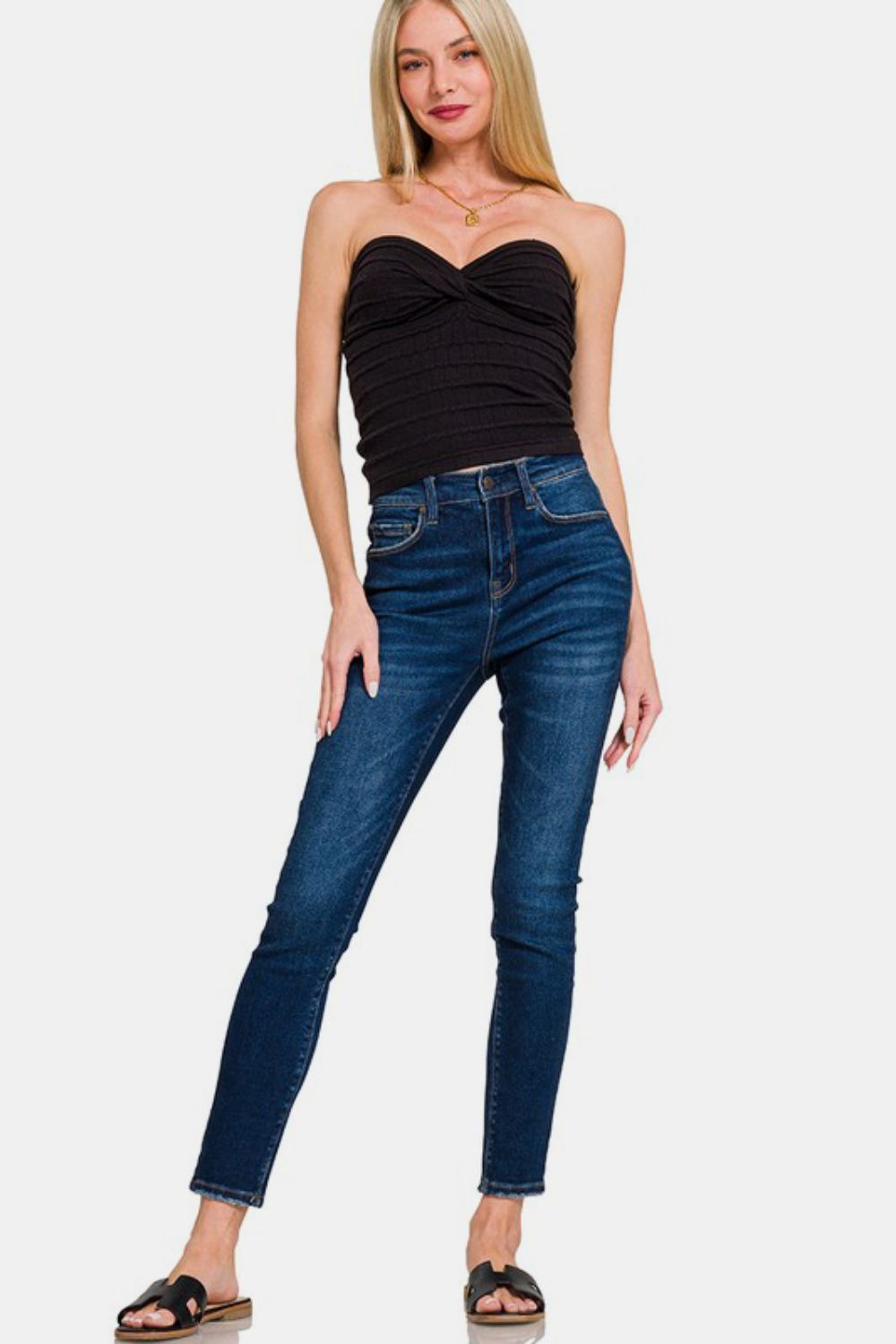 Ruched twisted sweetheart neck top, opaque and moderately stretchy.