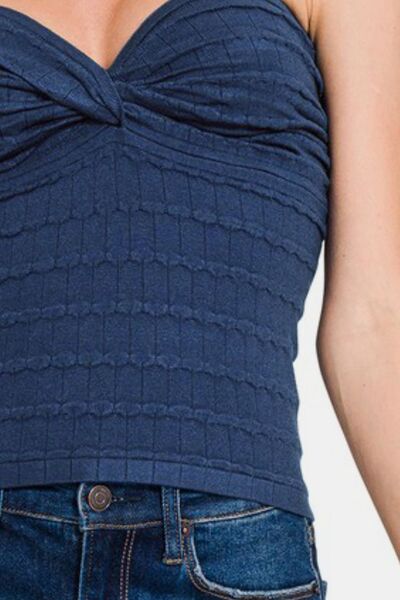 Ruched twisted sweetheart neck top, opaque and slightly stretchy.