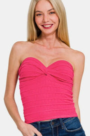 Ruched twisted sweetheart neck top, opaque and slightly stretchy.