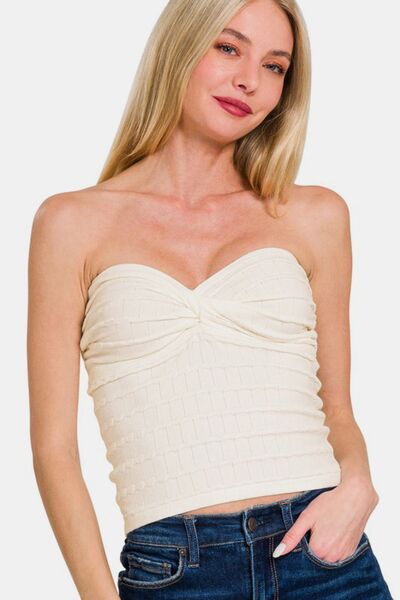 Ruched twisted sweetheart neck top, opaque and slightly stretchy.