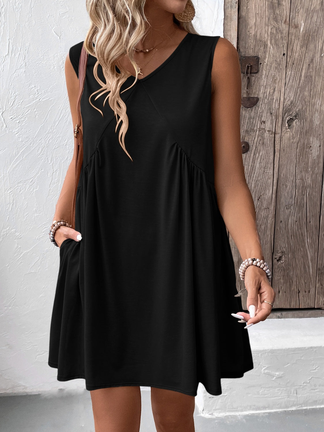 Ivy Lane Ruched V-Neck Sleeveless Mini Dress.