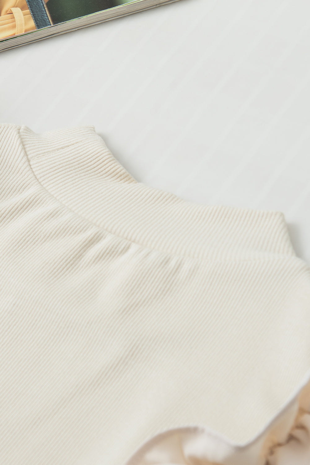 Ruffle Flutter Sleeve Mock Neck Ribbed Top.