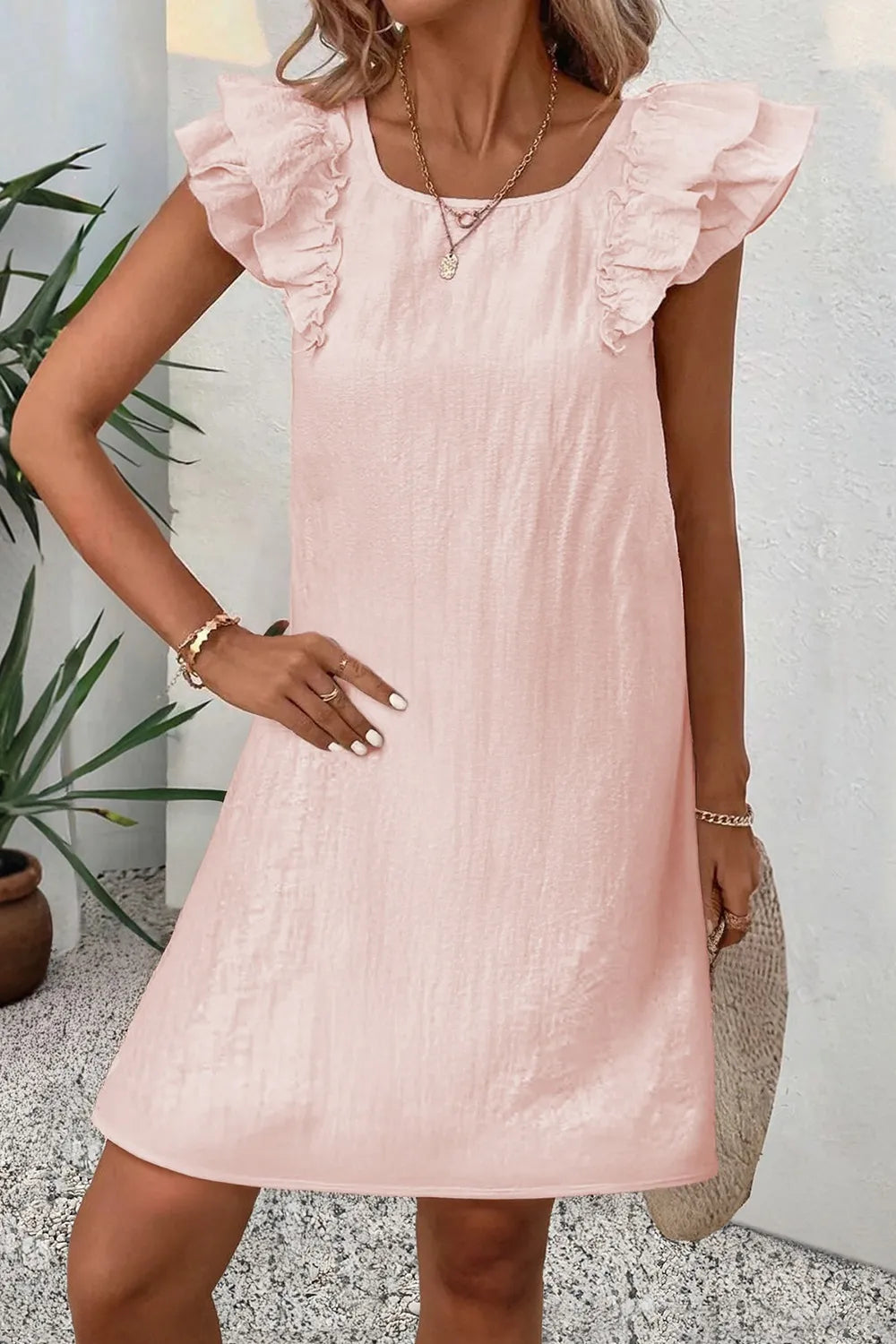 Ruffle Sleeve Bow Back Mini Dress.