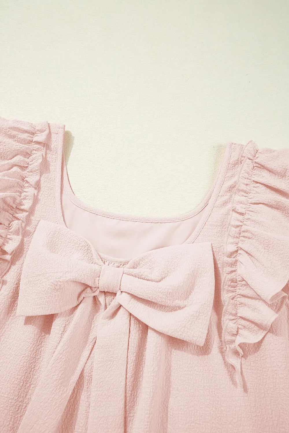 Ruffle Sleeve Bow Back Mini Dress.