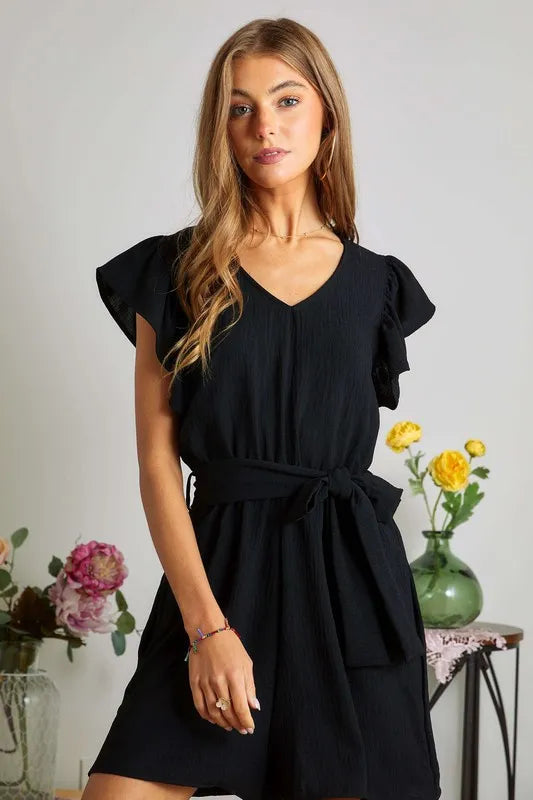 Textured Knit Button Front Romper with Drawstring and Pockets.