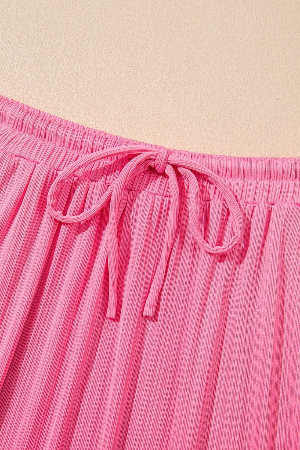 Ruffle Trim Round Neck Top and Drawstring Skirt Set.
