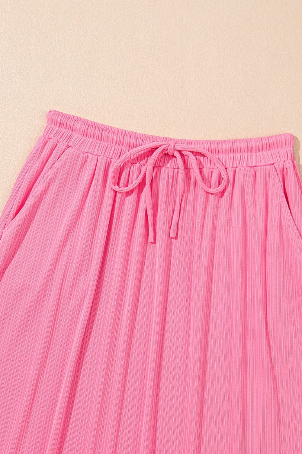 Ruffle Trim Round Neck Top and Drawstring Skirt Set.