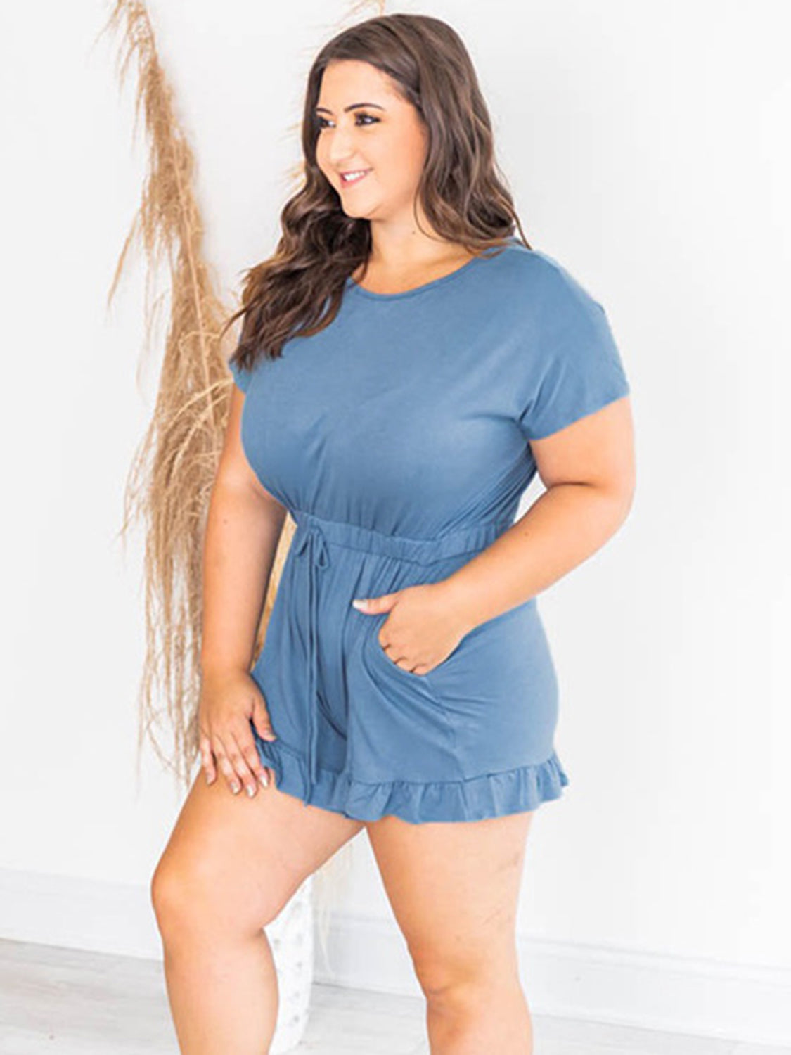 Ruffled Boat Neck Short Sleeve Romper with Pockets.