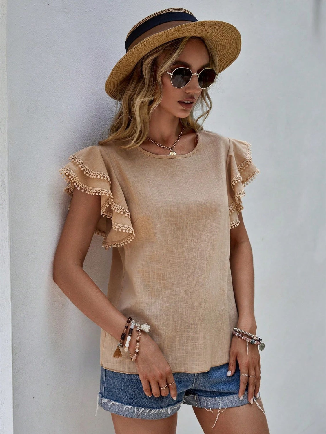 Ruffled Cap Sleeve Round Neck Blouse.