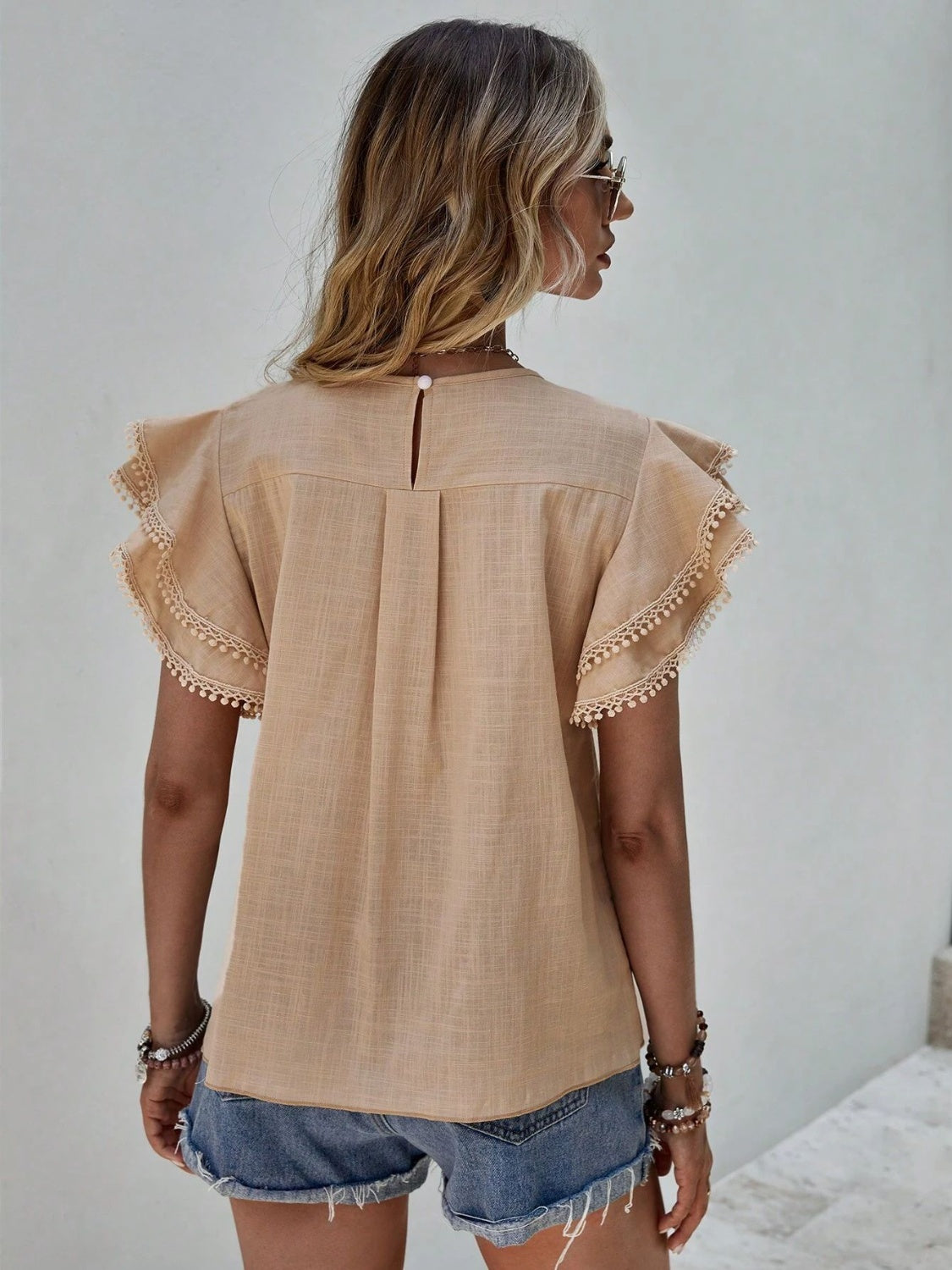 Ruffled Cap Sleeve Round Neck Blouse.