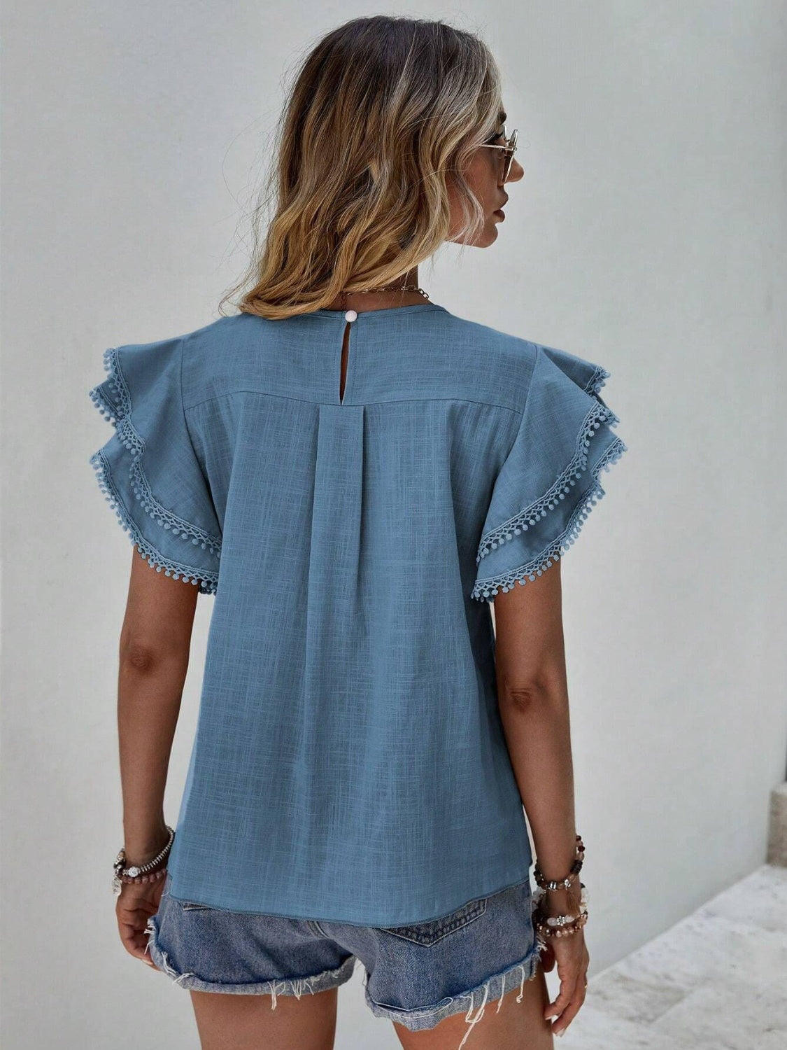 Ruffled Cap Sleeve Round Neck Blouse.