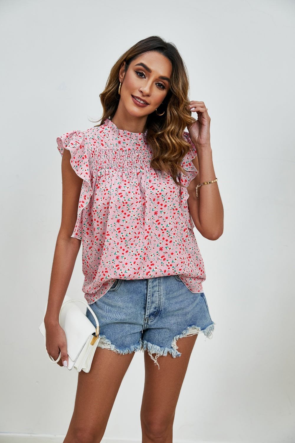 Ruffled Ditsy Floral Mock Neck Cap Sleeve Blouse.