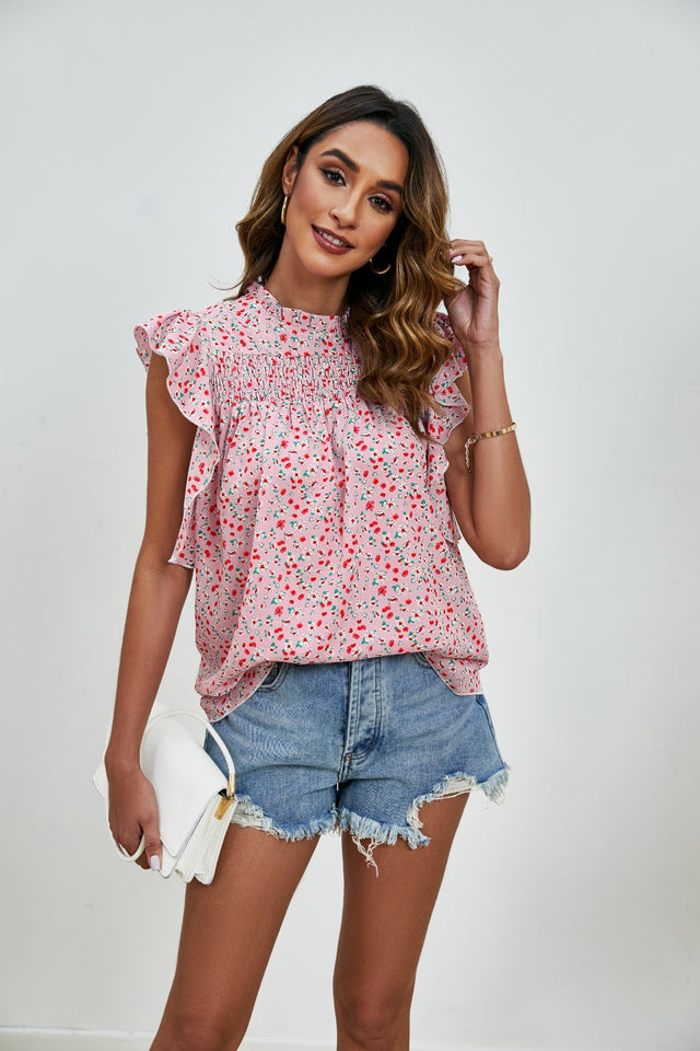 Ruffled Ditsy Floral Mock Neck Cap Sleeve Blouse.
