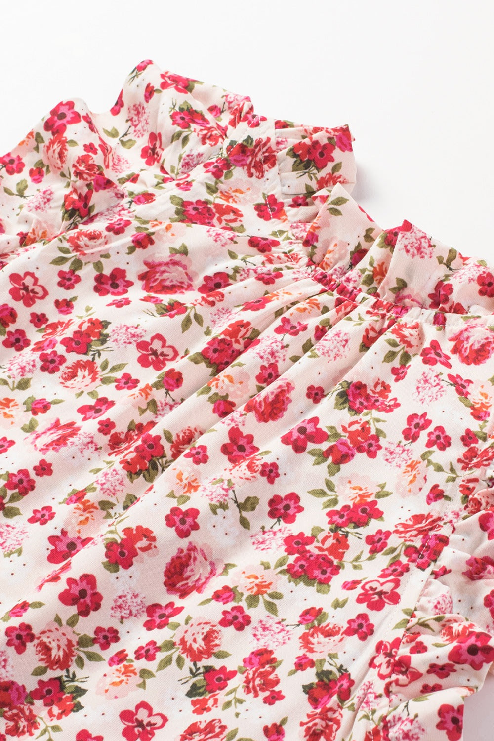 Ruffled Floral Round Neck Cap Sleeve Blouse.