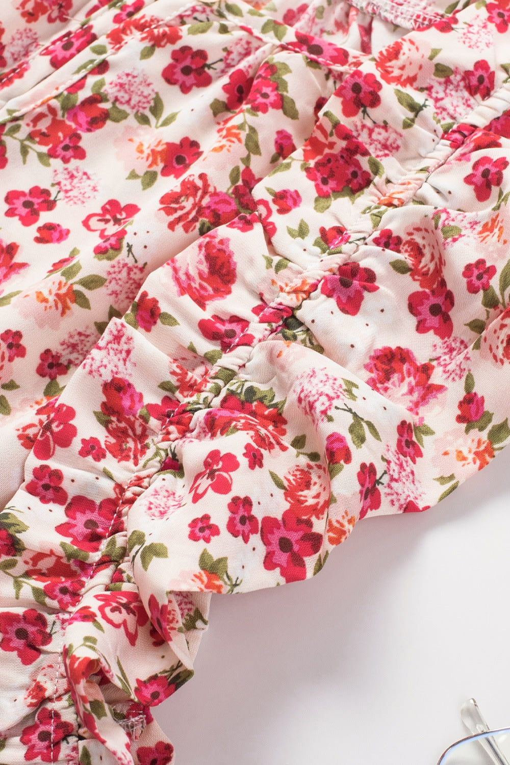 Ruffled Floral Round Neck Cap Sleeve Blouse.