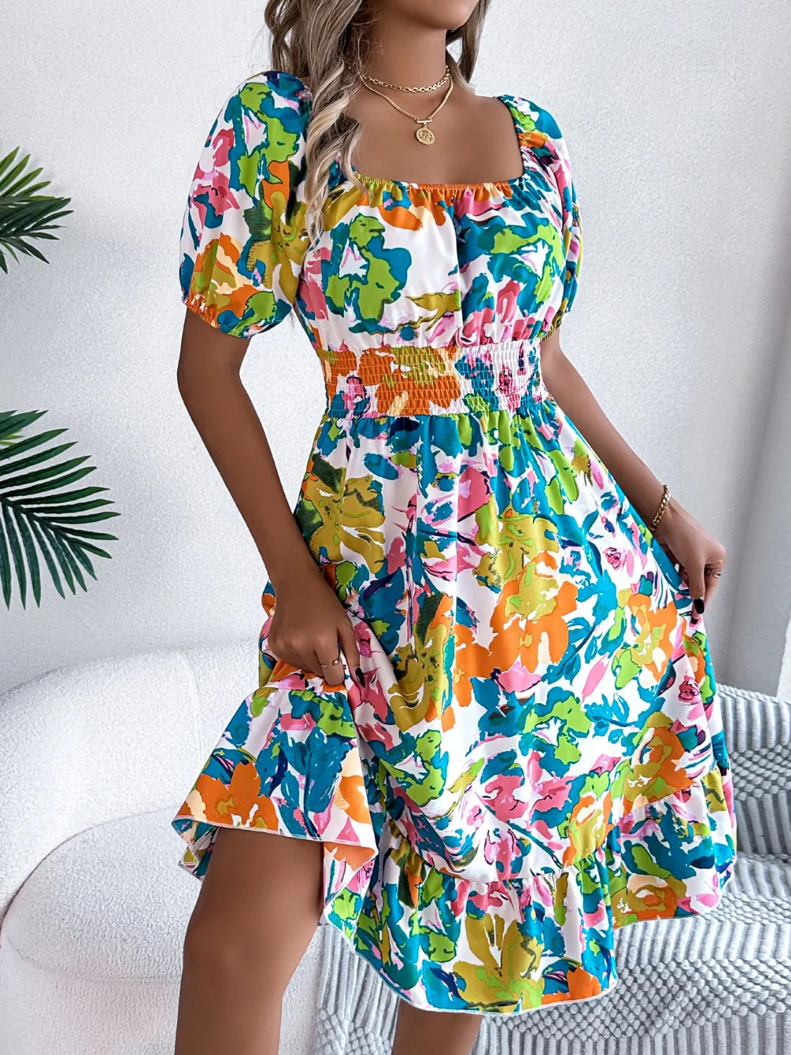 Ruffled Hem Smocked Floral Short Sleeve Midi Dress.