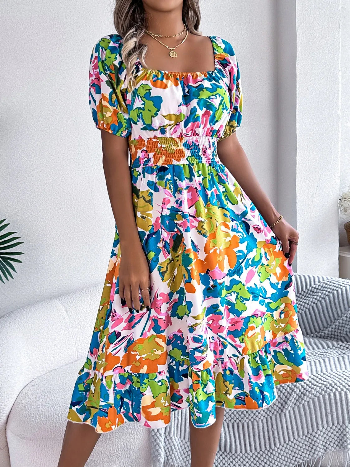 Ruffled Hem Smocked Floral Short Sleeve Midi Dress.