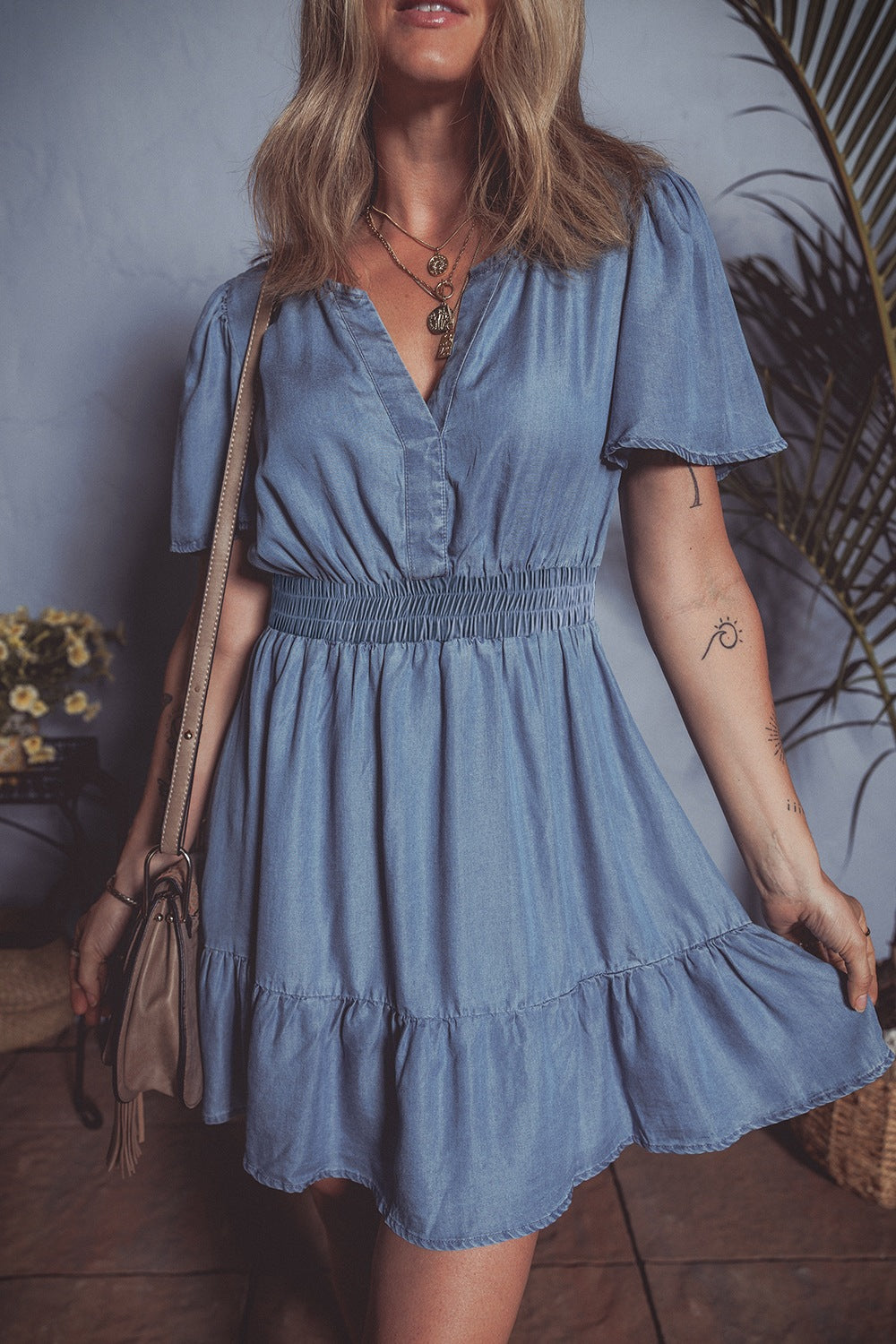 Ruffled Hem Smocked Flutter Sleeve Denim Mini Dress.