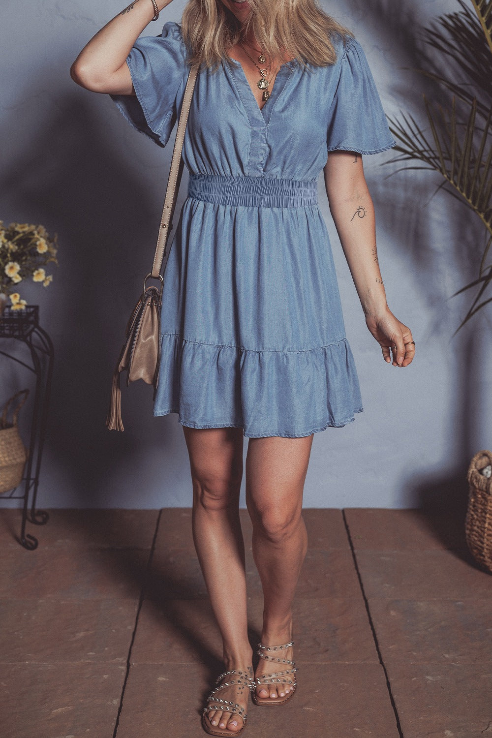 Ruffled Hem Smocked Flutter Sleeve Denim Mini Dress.