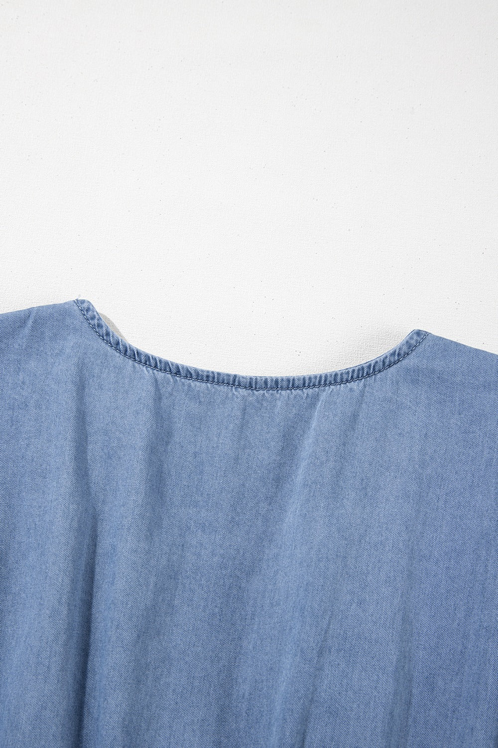 Ruffled Hem Smocked Flutter Sleeve Denim Mini Dress.