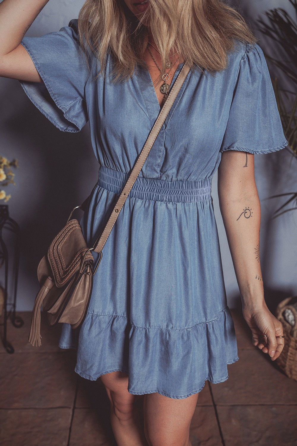 Ruffled Hem Smocked Flutter Sleeve Denim Mini Dress.