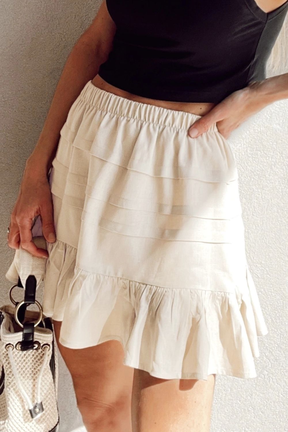 Ruffled Hemline Elastic Waist Mini Skirt.