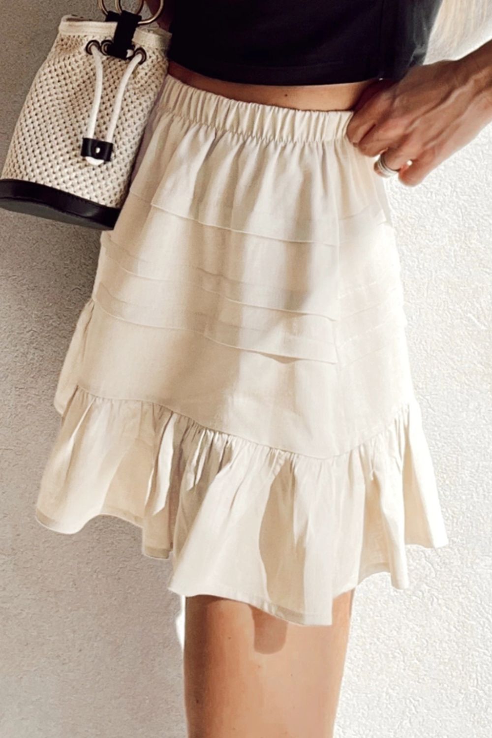 Ruffled Hemline Elastic Waist Mini Skirt.