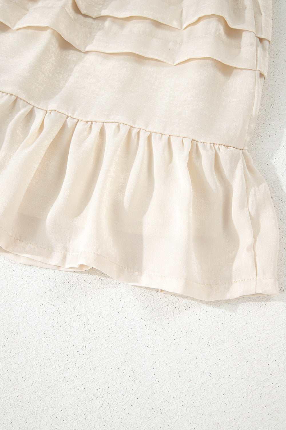 Ruffled Hemline Elastic Waist Mini Skirt.