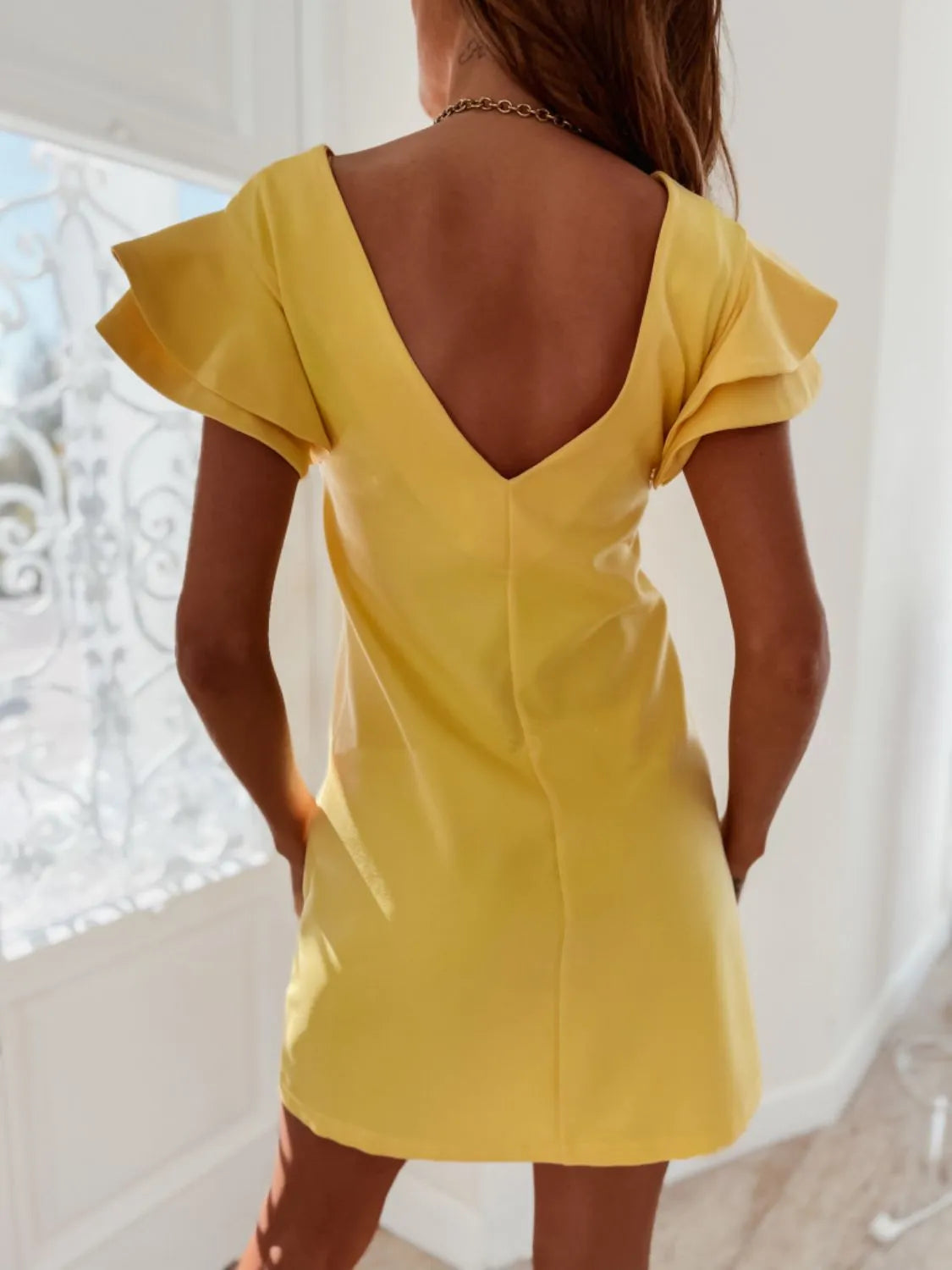 Ruffled Layered Short Sleeve Mini Dress.