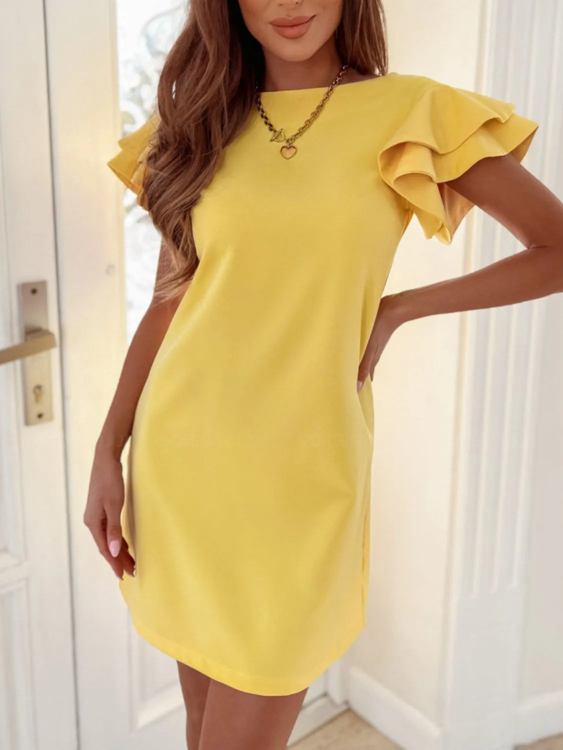 Ruffled Layered Short Sleeve Mini Dress.