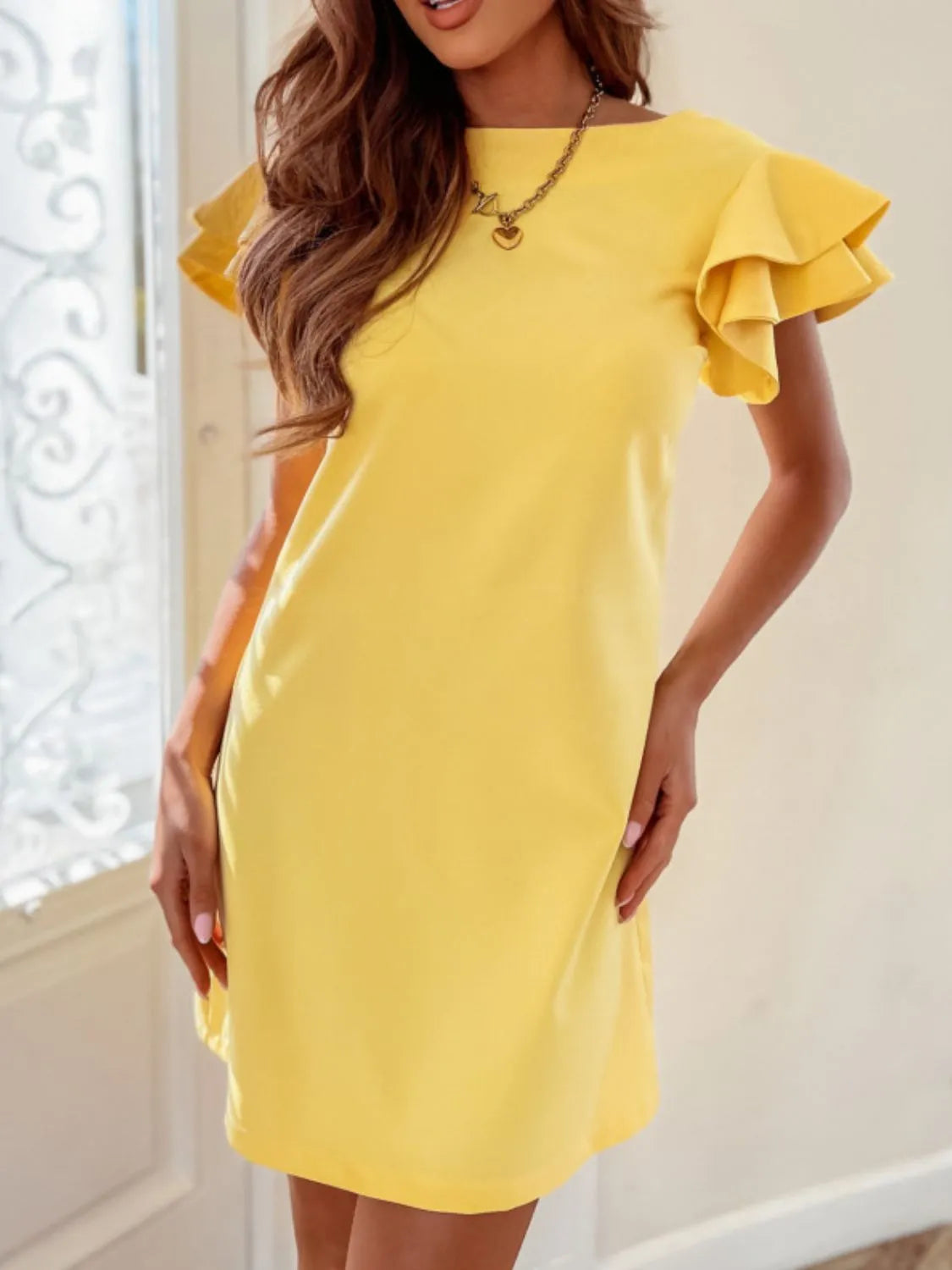 Ruffled Layered Short Sleeve Mini Dress.