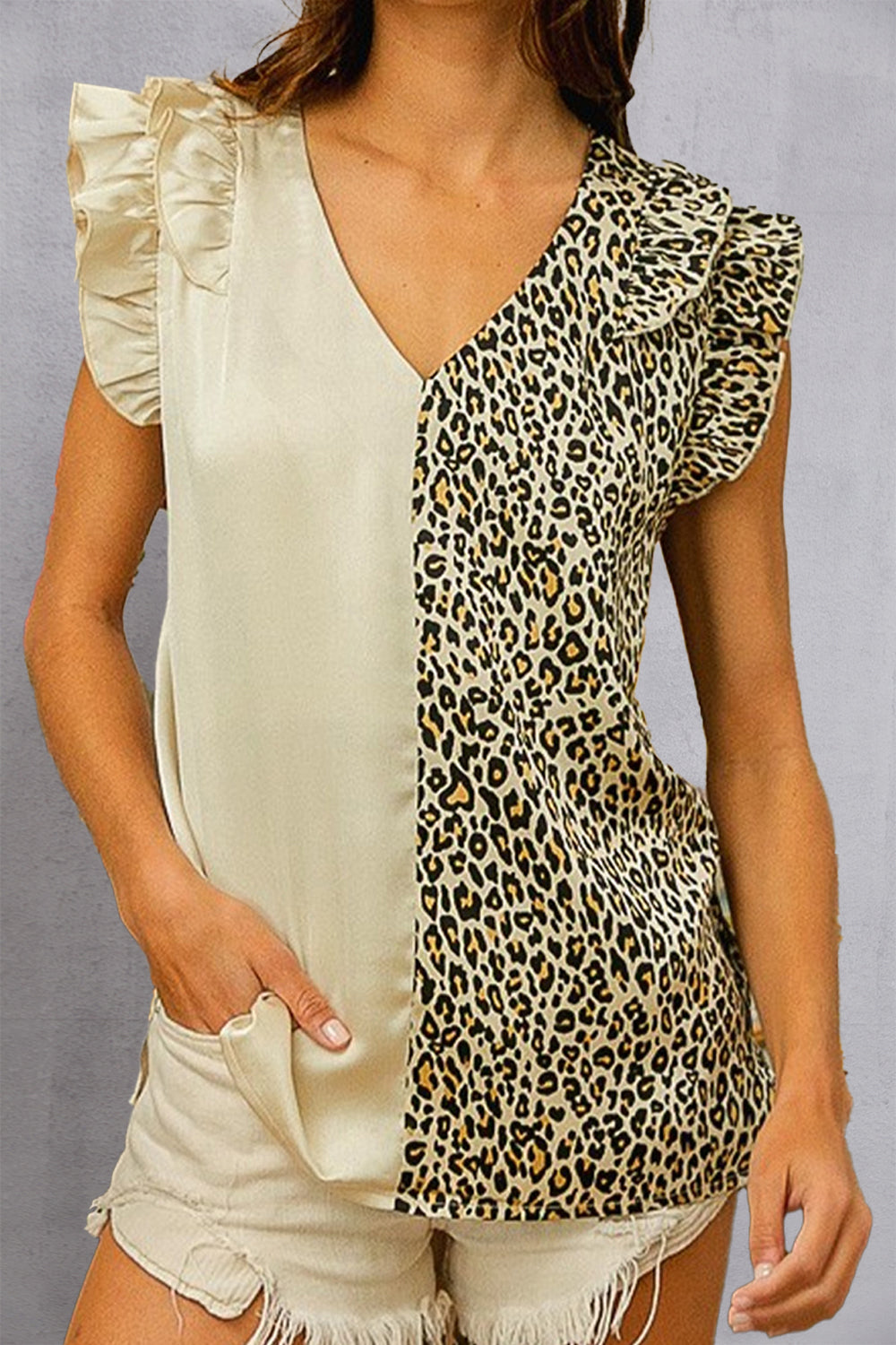 Ruffled Leopard V-Neck Cap Sleeve Blouse.