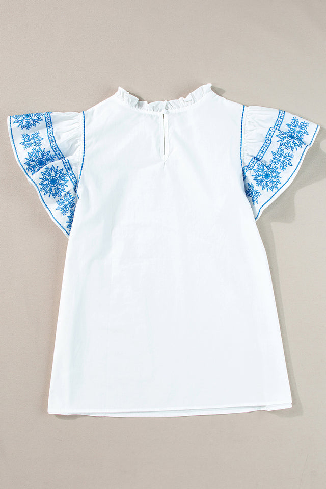 Ruffled Mock Neck Cap Sleeve Blouse.