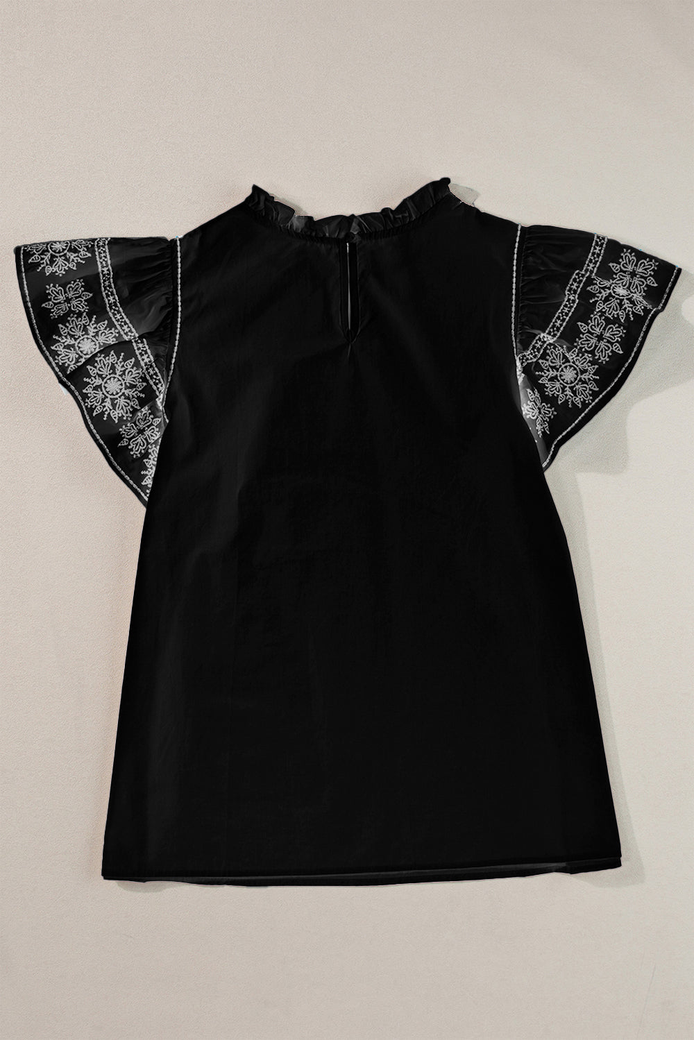 Ruffled Mock Neck Cap Sleeve Blouse.