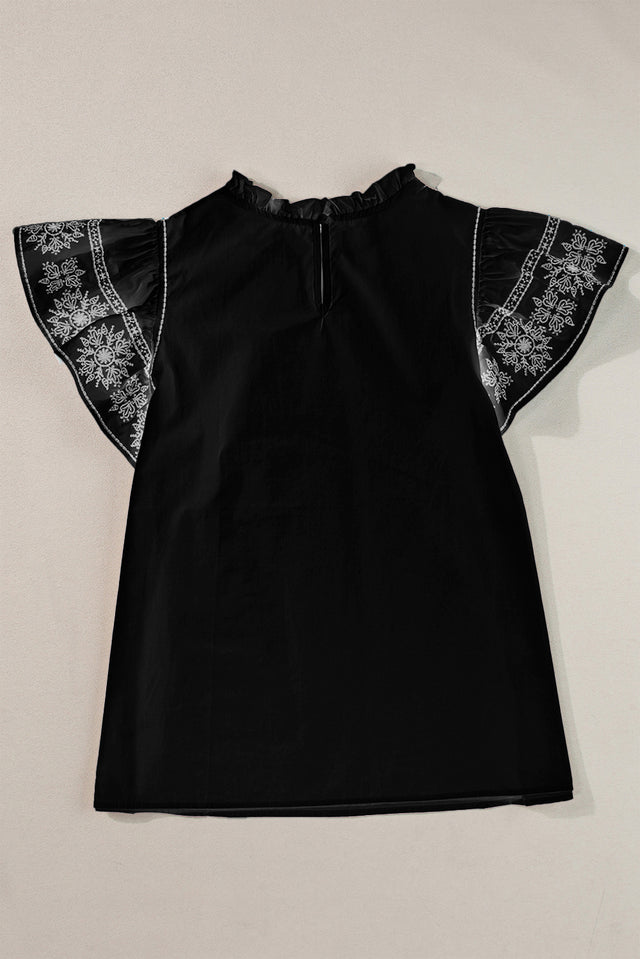 Ruffled Mock Neck Cap Sleeve Blouse.