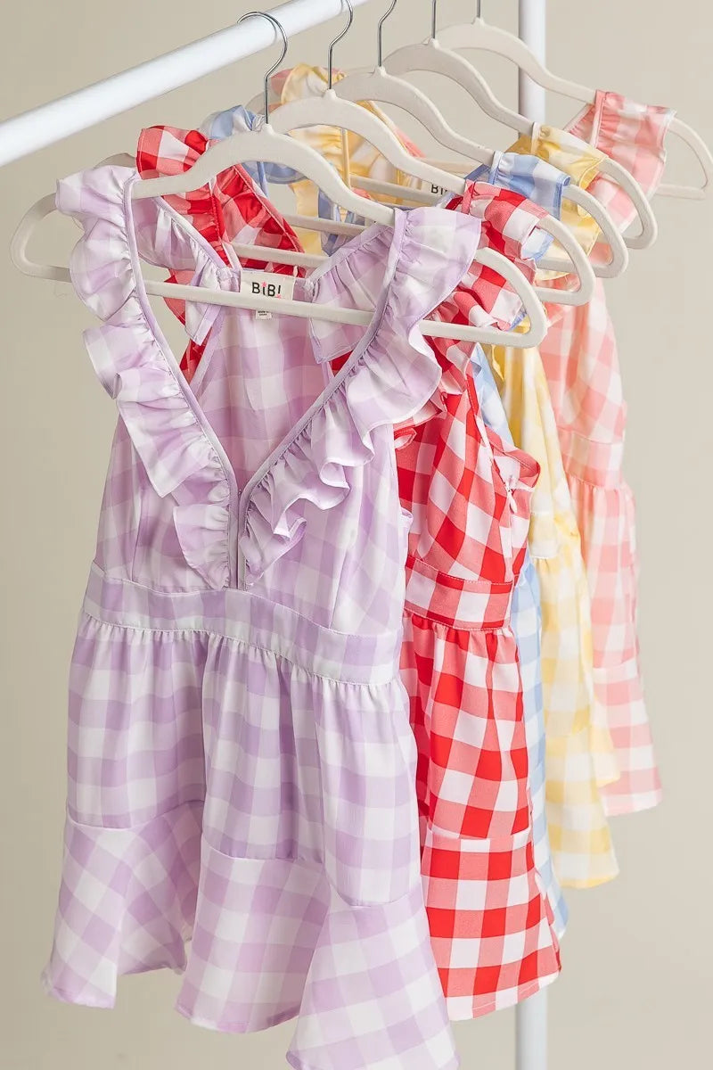 Ruffled neckline sleeveless check plaid peplum top.