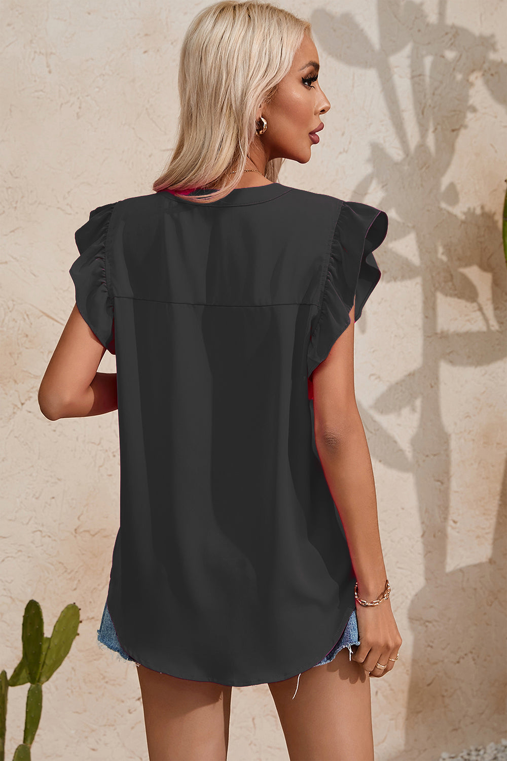 Ruffled Notched Cap Sleeve Blouse.